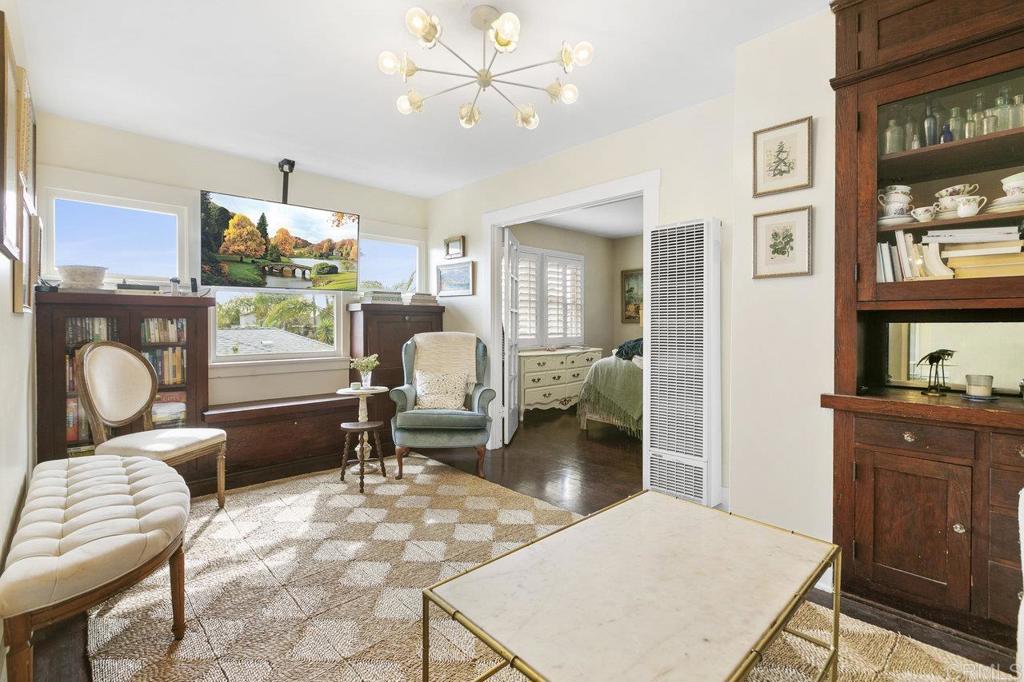 3373-3379 1/2 Herman Avenue San Diego, CA 92104 - Photo 24 of 70 a living room with furniture a lamp and large window