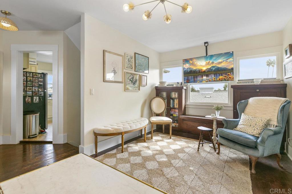 3373-3379 1/2 Herman Avenue San Diego, CA 92104 - Photo 25 of 70 a living room with furniture and a flat screen tv