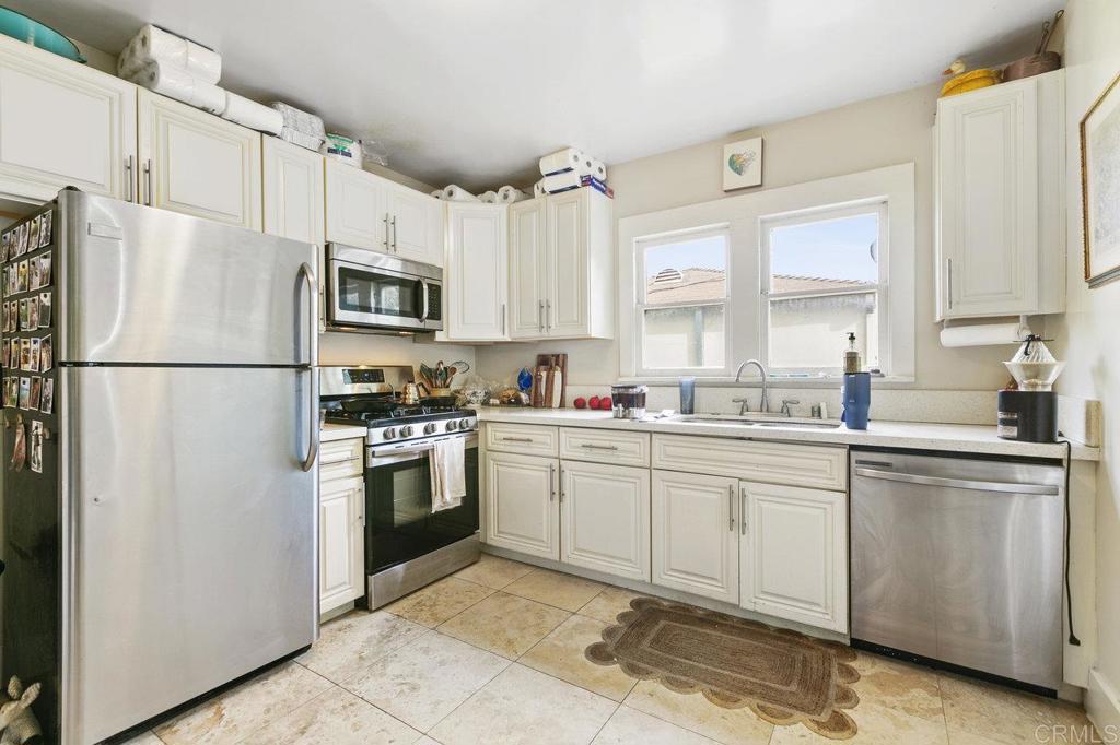 3373-3379 1/2 Herman Avenue San Diego, CA 92104 - Photo 27 of 70 Front duplex, top unit kitchen