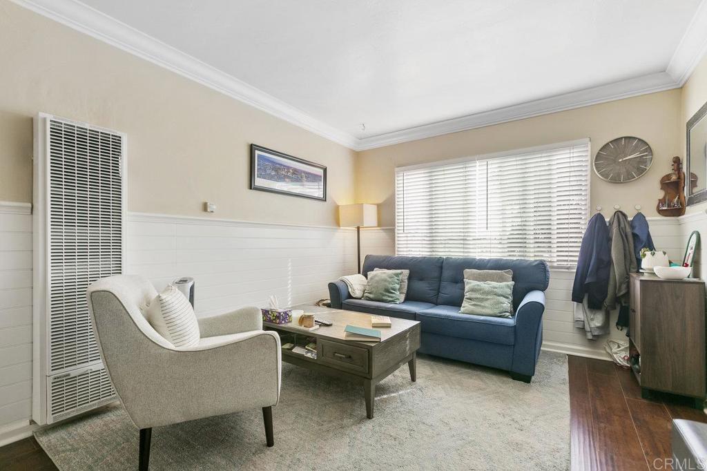 3373-3379 1/2 Herman Avenue San Diego, CA 92104 - Photo 34 of 70 a living room with furniture and a window