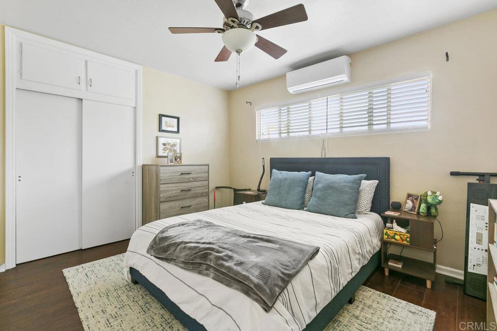 3373-3379 1/2 Herman Avenue San Diego, CA 92104 - Photo 37 of 70 a bedroom with a bed and a dresser