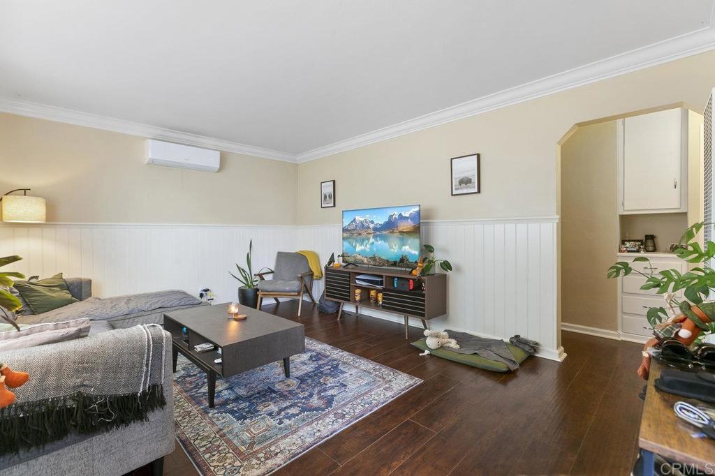 3373-3379 1/2 Herman Avenue San Diego, CA 92104 - Photo 39 of 70 a living room with furniture and a flat screen tv