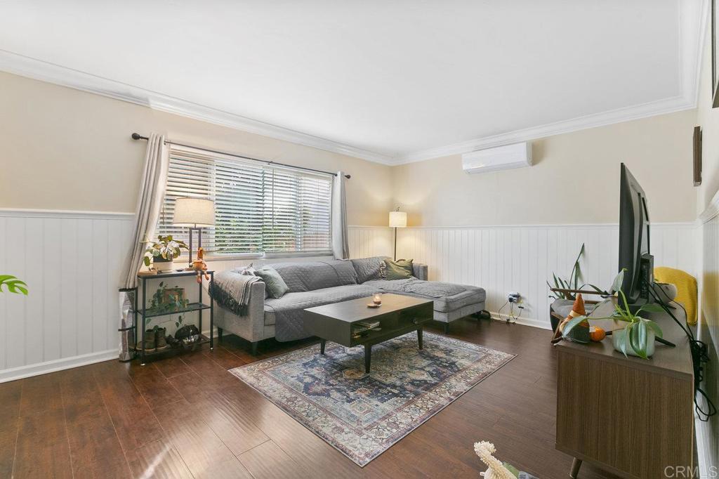 3373-3379 1/2 Herman Avenue San Diego, CA 92104 - Photo 40 of 70 a living room with furniture and a flat screen tv