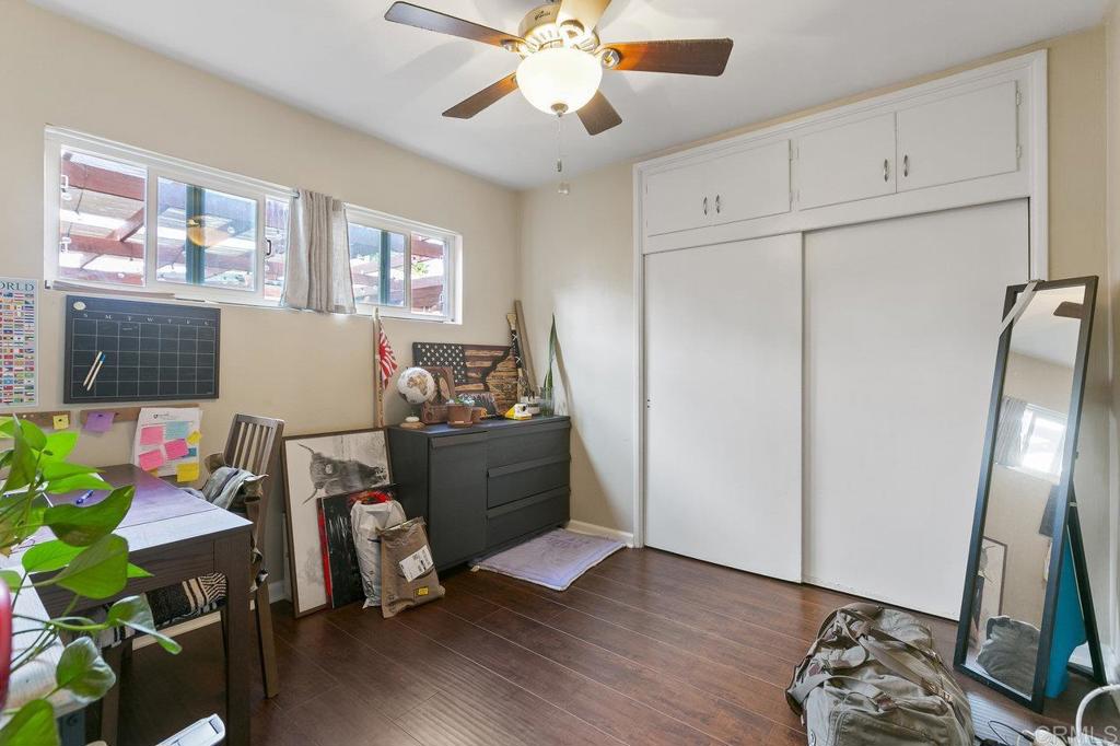 3373-3379 1/2 Herman Avenue San Diego, CA 92104 - Photo 42 of 70 a view of a workspace with furniture and a flat screen tv