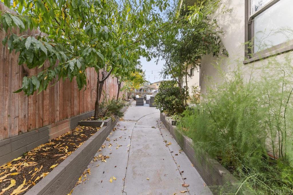 3373-3379 1/2 Herman Avenue San Diego, CA 92104 - Photo 49 of 70 a view of a pathway both side of the house