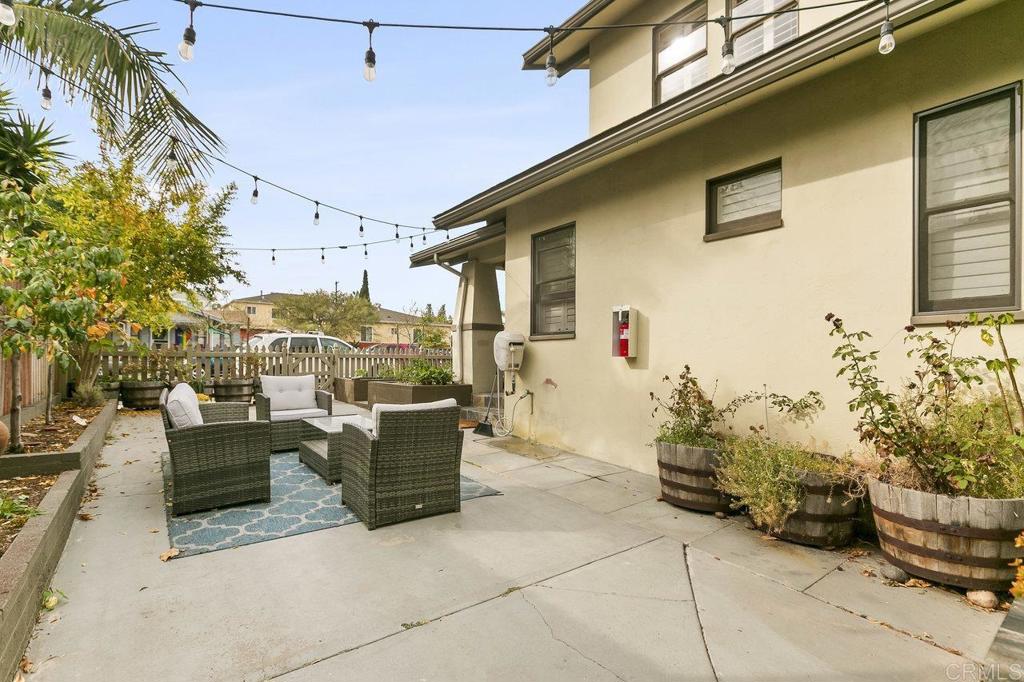 3373-3379 1/2 Herman Avenue San Diego, CA 92104 - Photo 50 of 70 a view of a patio with couches and potted plants