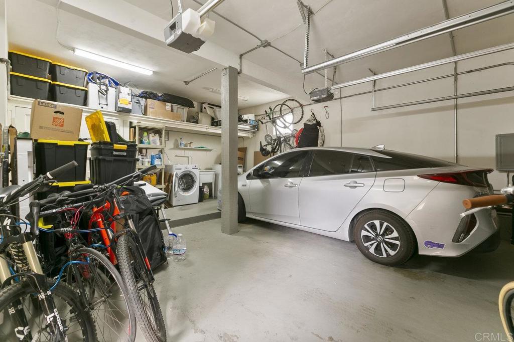 3373-3379 1/2 Herman Avenue San Diego, CA 92104 - Photo 58 of 70 a view of a garage with a bike and a car