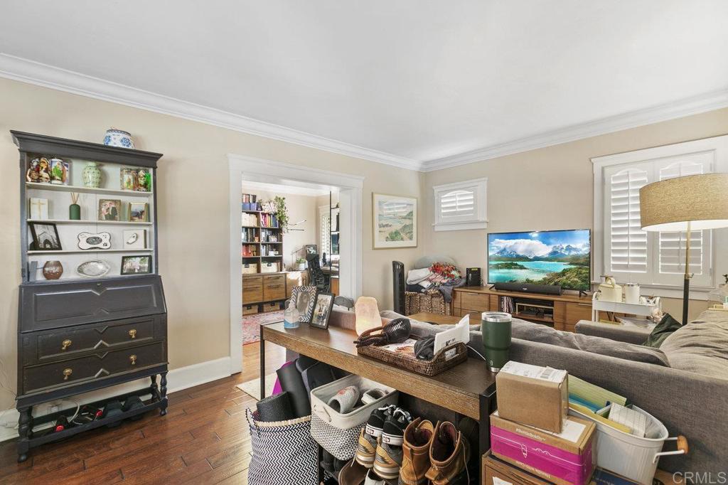 3373-3379 1/2 Herman Avenue San Diego, CA 92104 - Photo 8 of 70 a living room with furniture and a flat screen tv