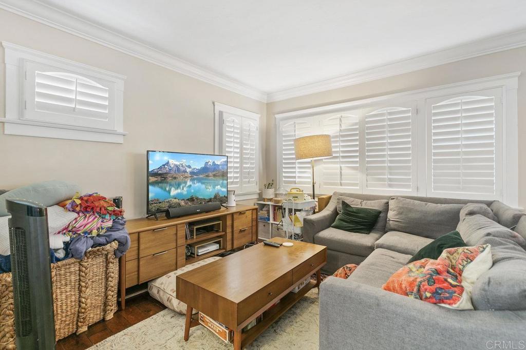 3373-3379 1/2 Herman Avenue San Diego, CA 92104 - Photo 9 of 70 a living room with furniture and a flat screen tv