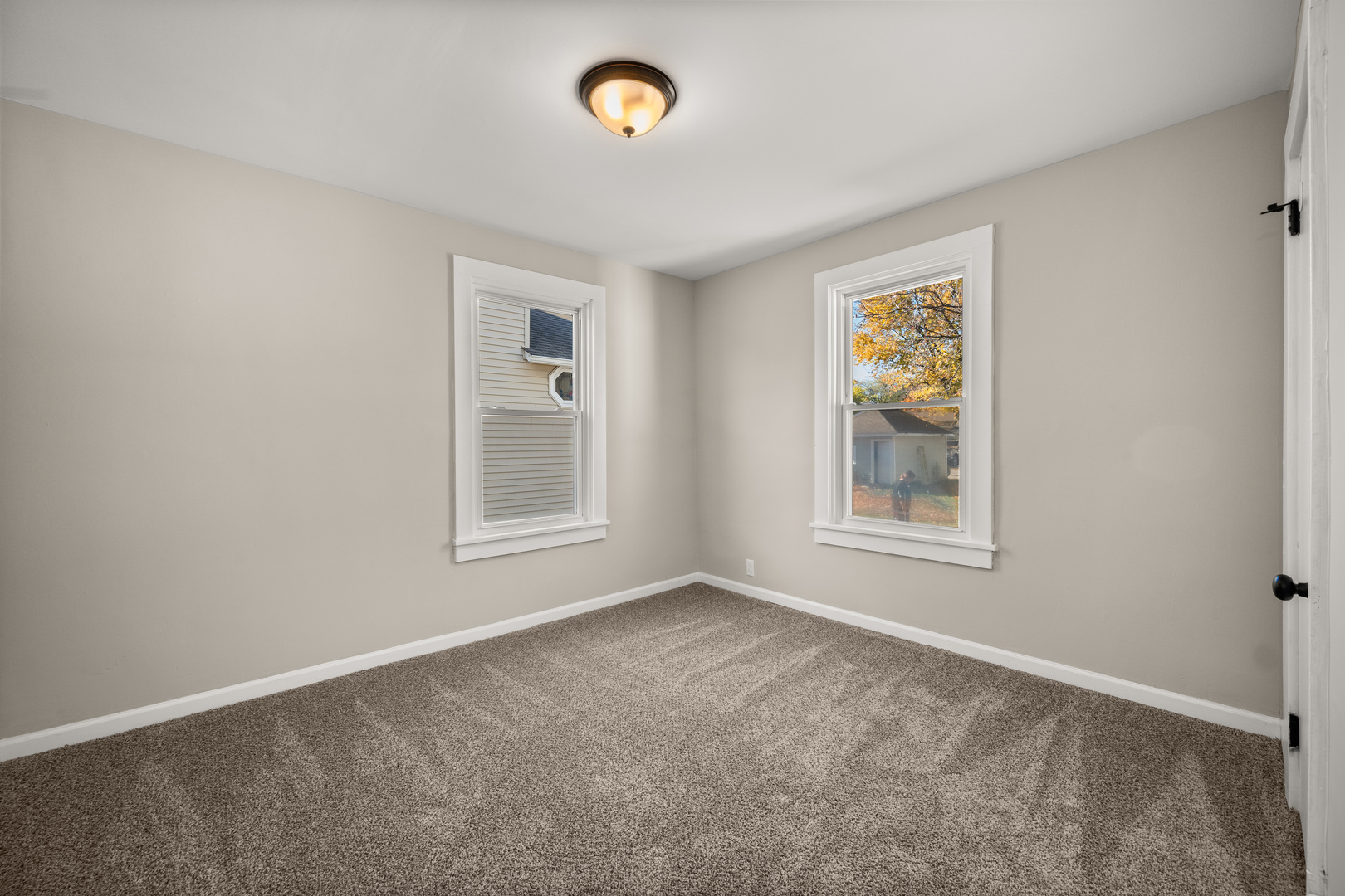 321 North Locust Street Sycamore, IL 60178 - Photo 12 of 38 an empty room with windows