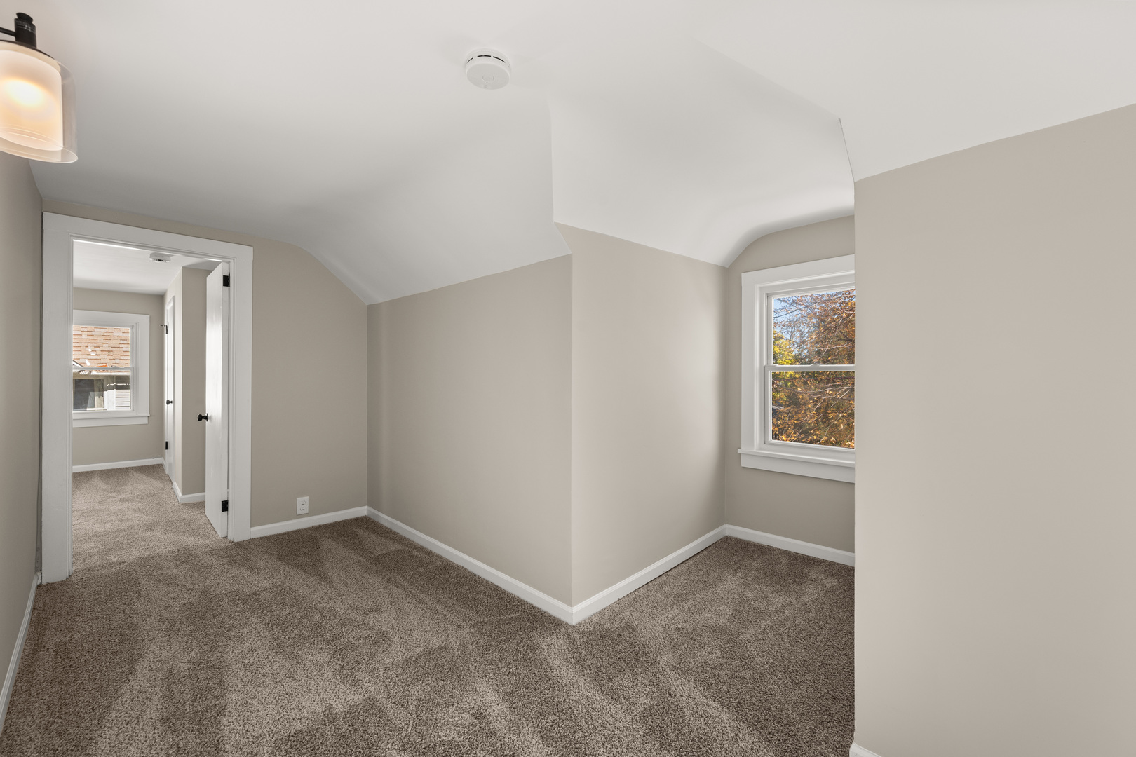 321 North Locust Street Sycamore, IL 60178 - Photo 15 of 38 an empty room with windows