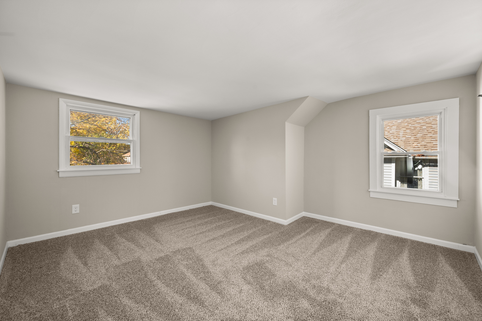 321 North Locust Street Sycamore, IL 60178 - Photo 16 of 38 a view of an empty room with a window