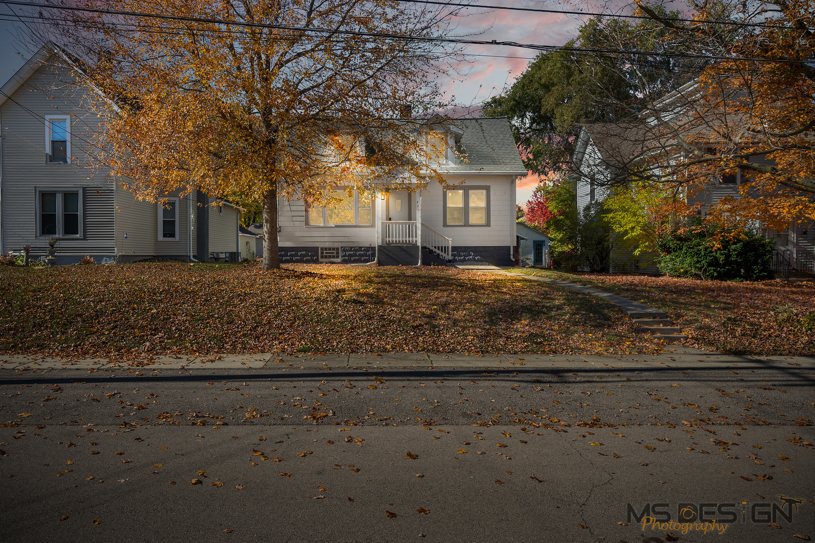 321 North Locust Street Sycamore, IL 60178 - Photo 2 of 38 a front view of a house with a yard