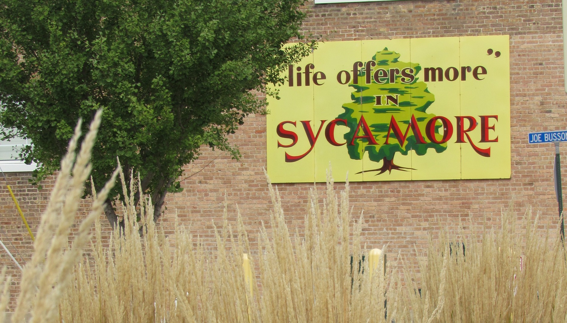 321 North Locust Street Sycamore, IL 60178 - Photo 29 of 38 a sign that is on the side of a building