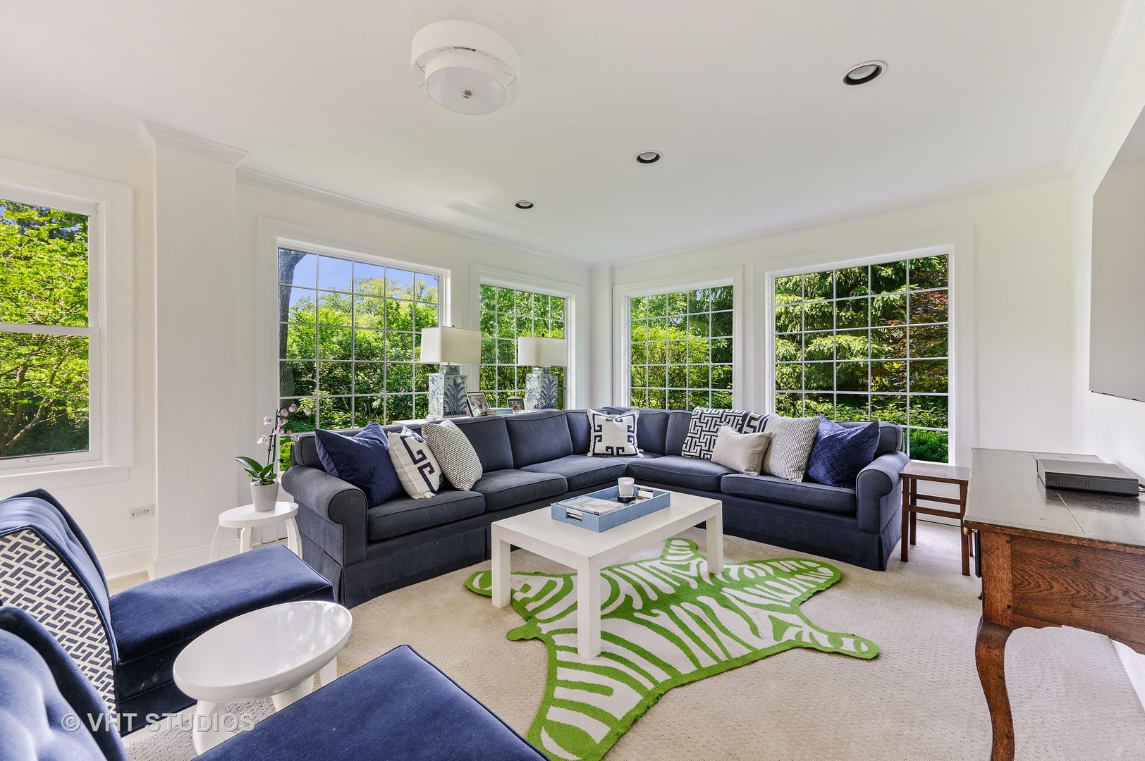 44 Indian Hill Road Winnetka, IL 60093 - Photo 21 of 49 a living room with furniture and a large window