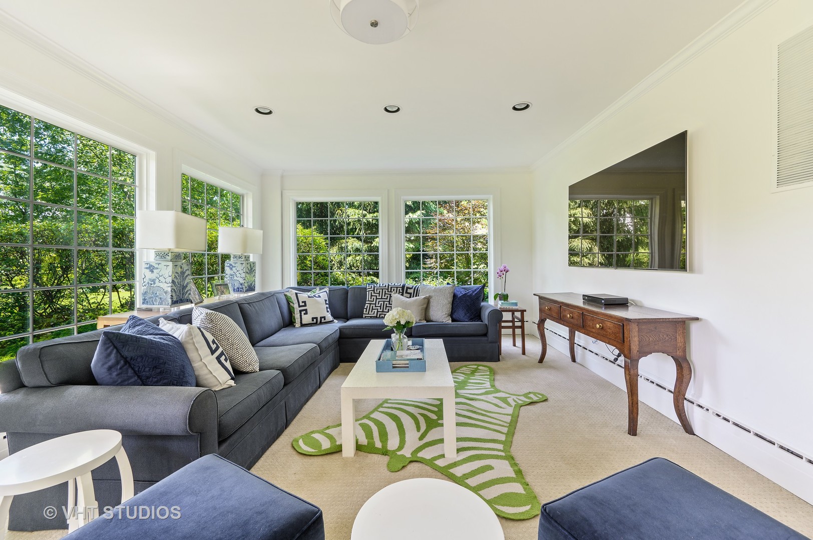 44 Indian Hill Road Winnetka, IL 60093 - Photo 22 of 49 a living room with furniture and a large window