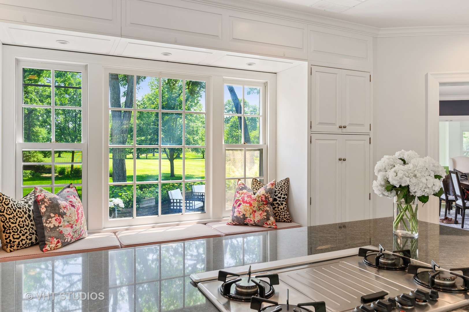 44 Indian Hill Road Winnetka, IL 60093 - Photo 27 of 49 a living room filled with furniture and a large window