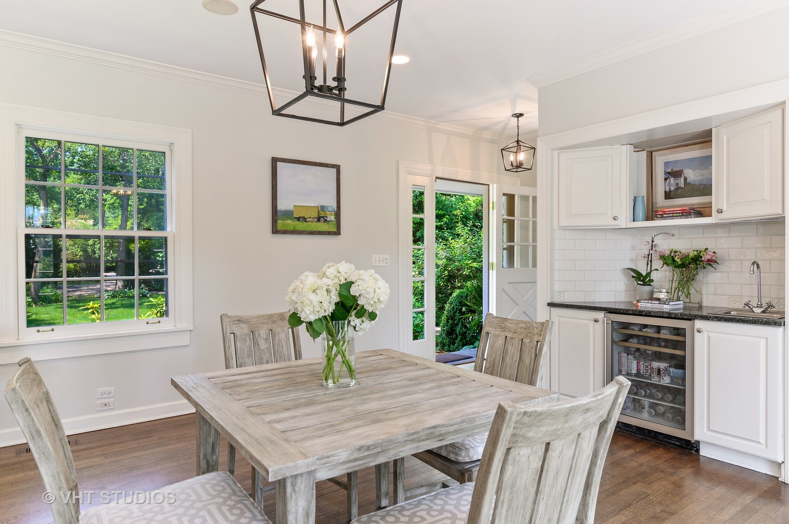 44 Indian Hill Road Winnetka, IL 60093 - Photo 28 of 49 a view of a dining room with furniture window and wooden floor