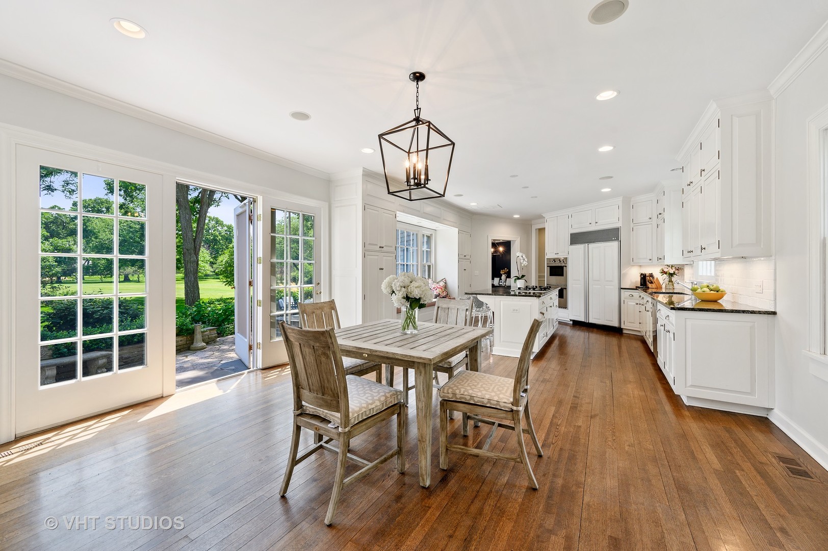 44 Indian Hill Road Winnetka, IL 60093 - Photo 29 of 49 a view of a dining room with furniture window and wooden floor