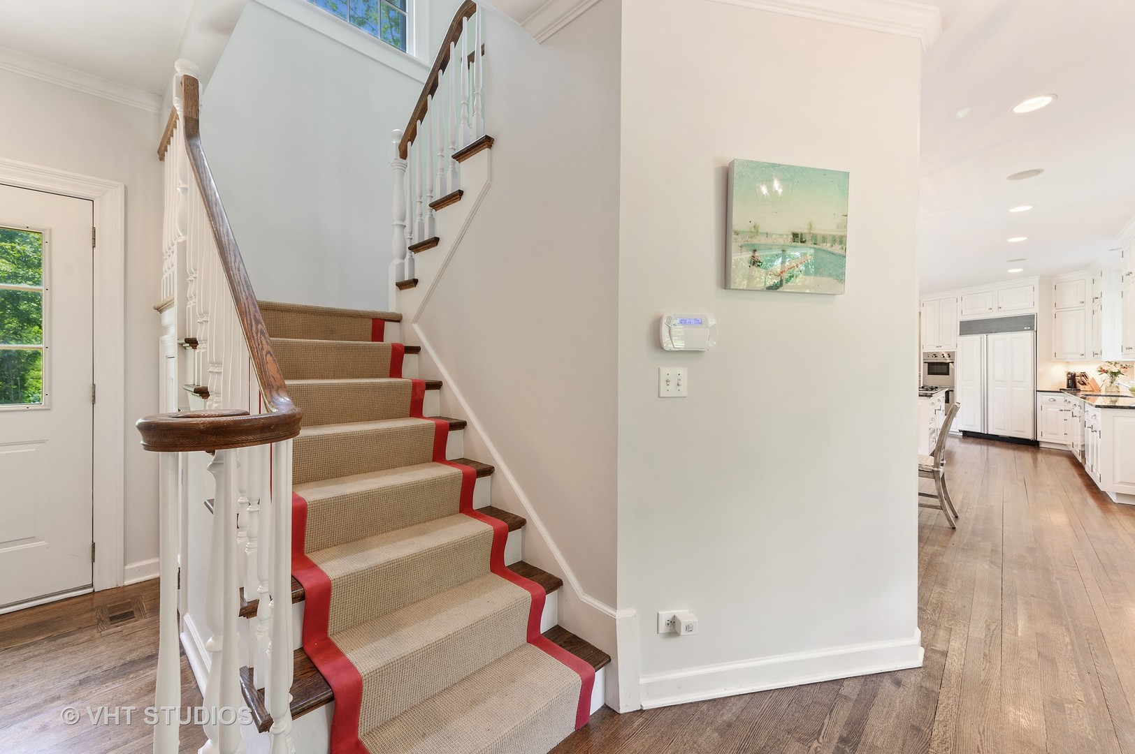 44 Indian Hill Road Winnetka, IL 60093 - Photo 33 of 49 a view of entryway with wooden floor and stairs