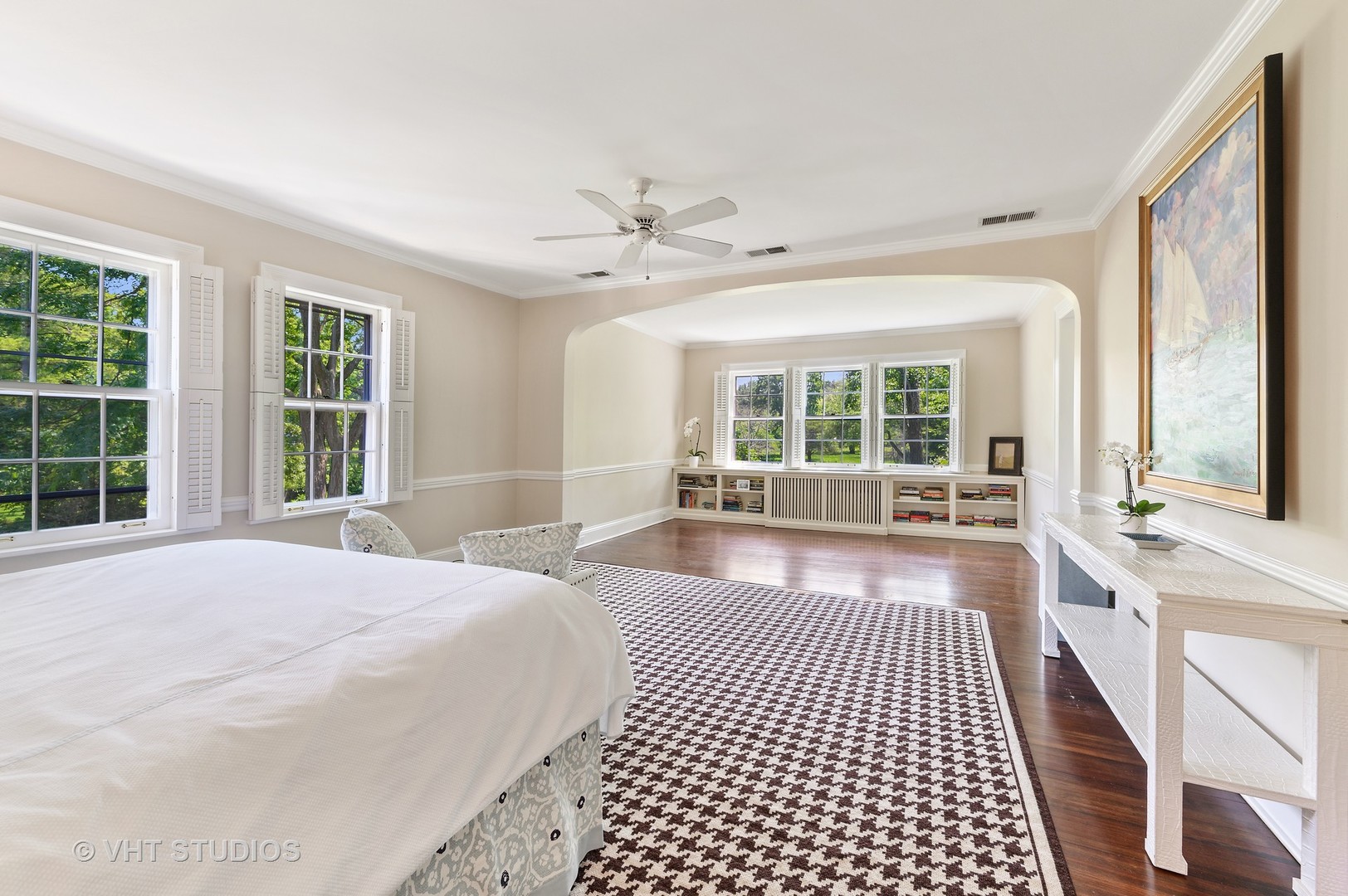 44 Indian Hill Road Winnetka, IL 60093 - Photo 36 of 49 a large bedroom with a large window and a chandelier