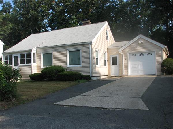 88 Woodrow Street Springfield, MA 01119 - Photo 1 of 4 front view of a house with a yard