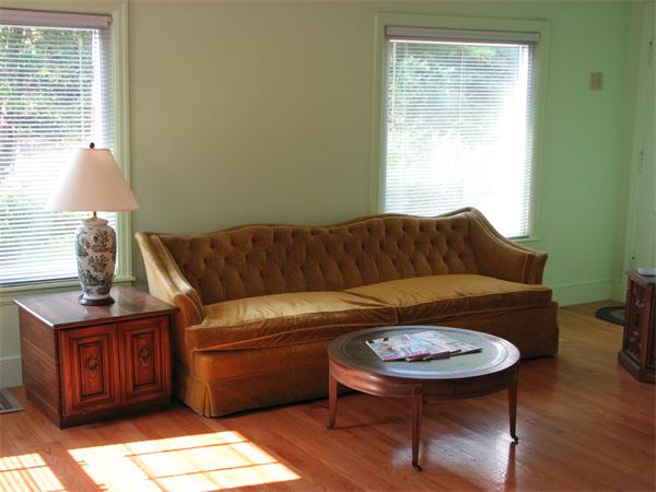 88 Woodrow Street Springfield, MA 01119 - Photo 3 of 4 a living room with a couch and a table