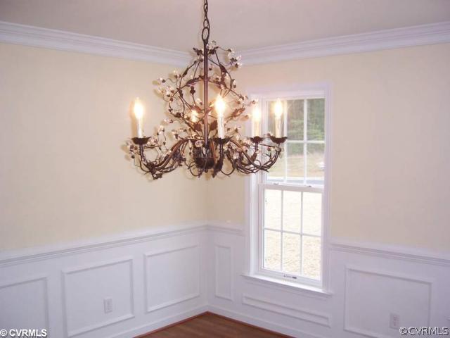 11909 Rimswell Terrace Midlothian, VA 23112 - Photo 4 of 11 Dining Room - Formal Dining Room with crown,chair