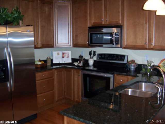 11909 Rimswell Terrace Midlothian, VA 23112 - Photo 7 of 11 Kitchen - Options abound in the open and bright ki
