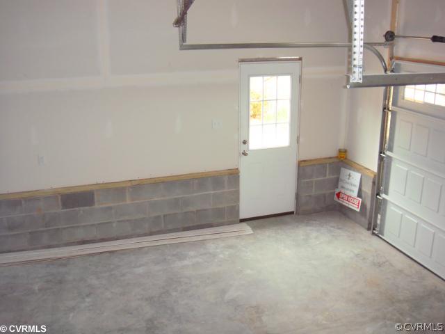 11909 Rimswell Terrace Midlothian, VA 23112 - Photo 10 of 11 Parking Lot/Garage - All kennedy homes have finish