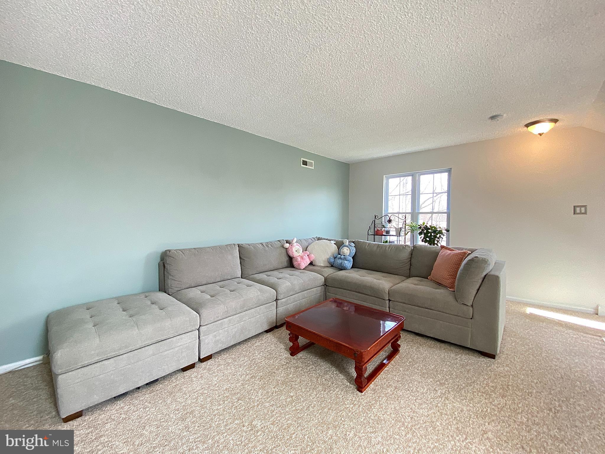 508 Trescott Place Mount Laurel, NJ 08054 - Photo 11 of 12 a living room with furniture and a couch