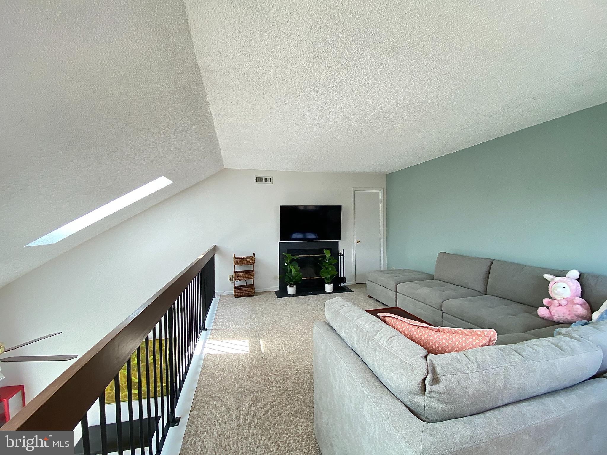 508 Trescott Place Mount Laurel, NJ 08054 - Photo 12 of 12 a living room with furniture and a flat screen tv