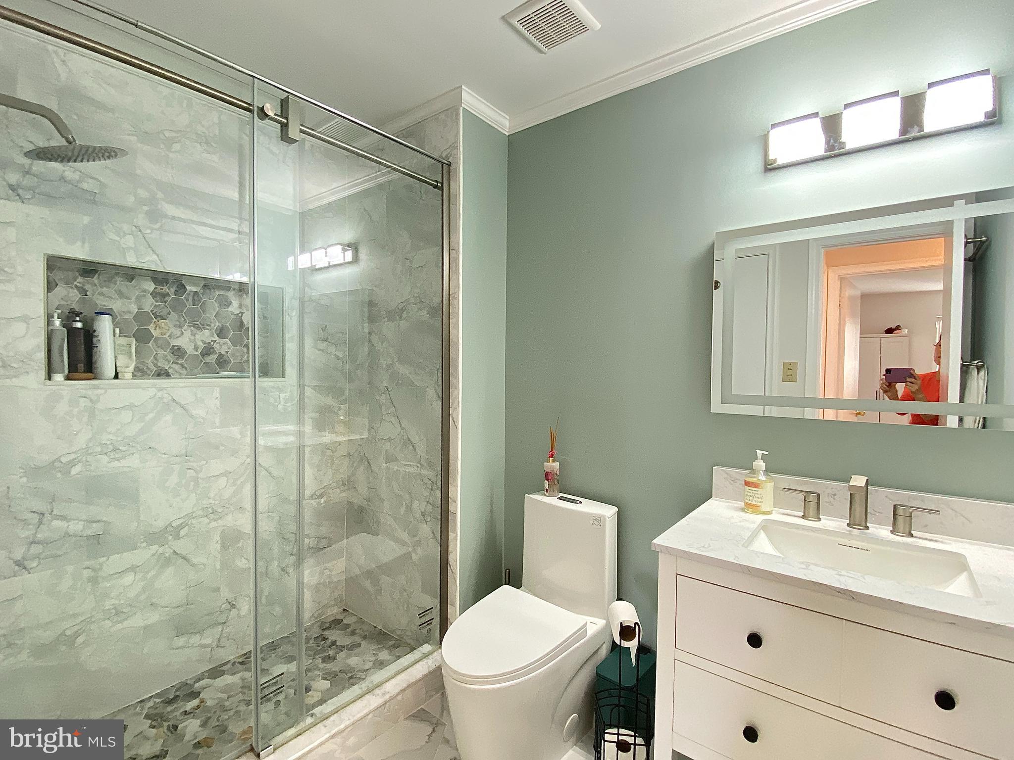 508 Trescott Place Mount Laurel, NJ 08054 - Photo 4 of 12 a bathroom with a sink toilet vanity and shower