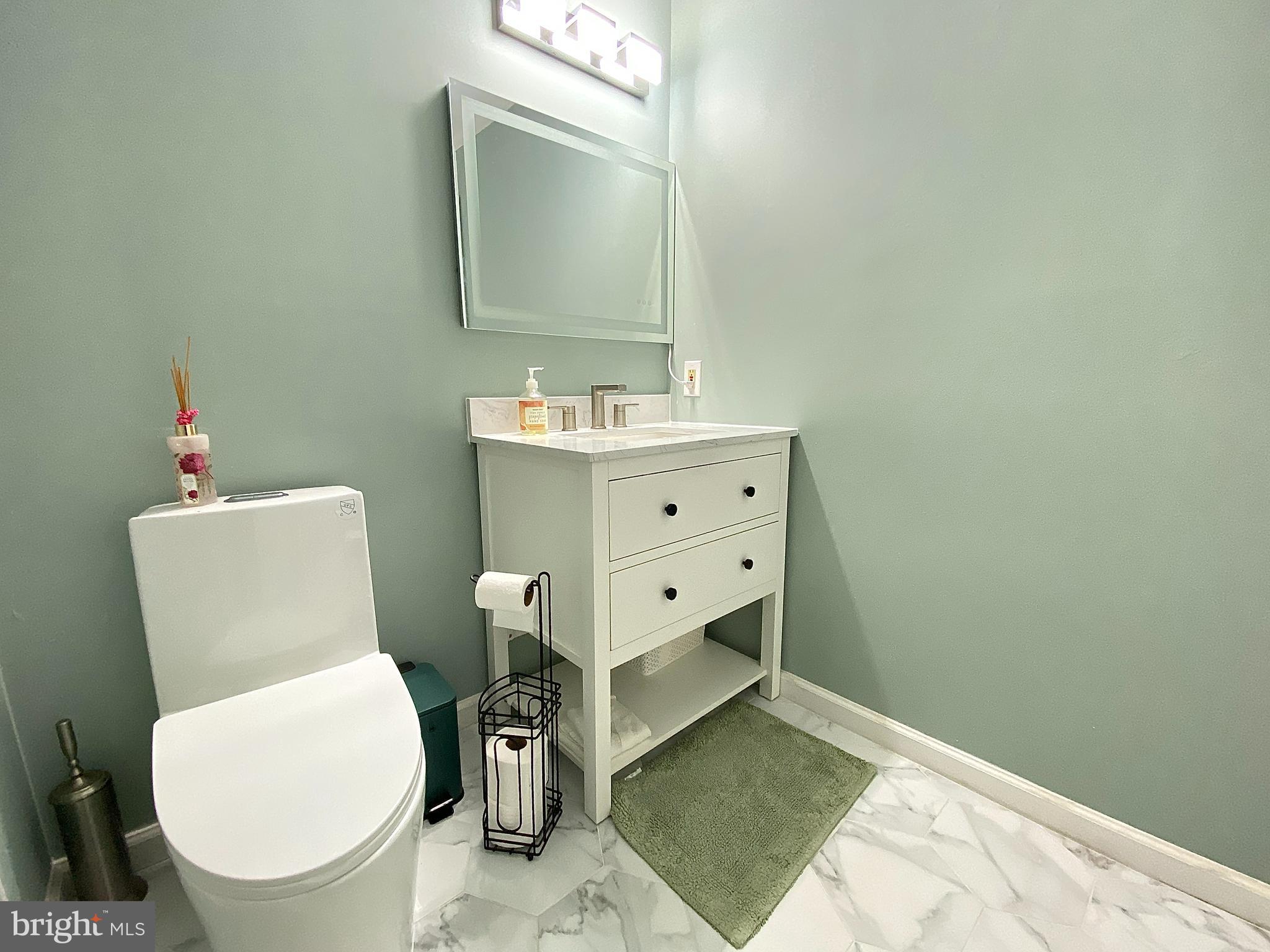 508 Trescott Place Mount Laurel, NJ 08054 - Photo 6 of 12 a bathroom with a toilet a sink and mirror
