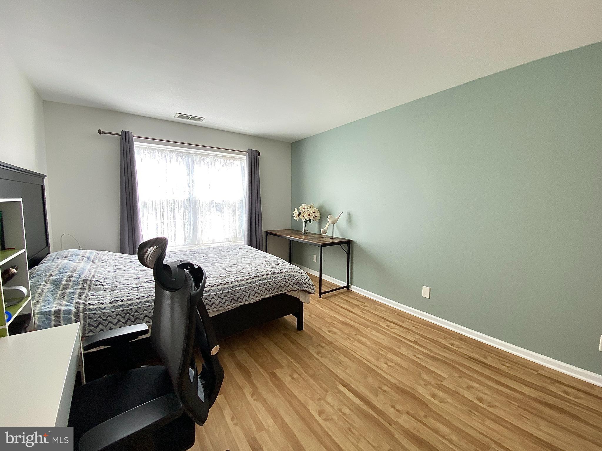508 Trescott Place Mount Laurel, NJ 08054 - Photo 7 of 12 a bedroom with a bed and a window