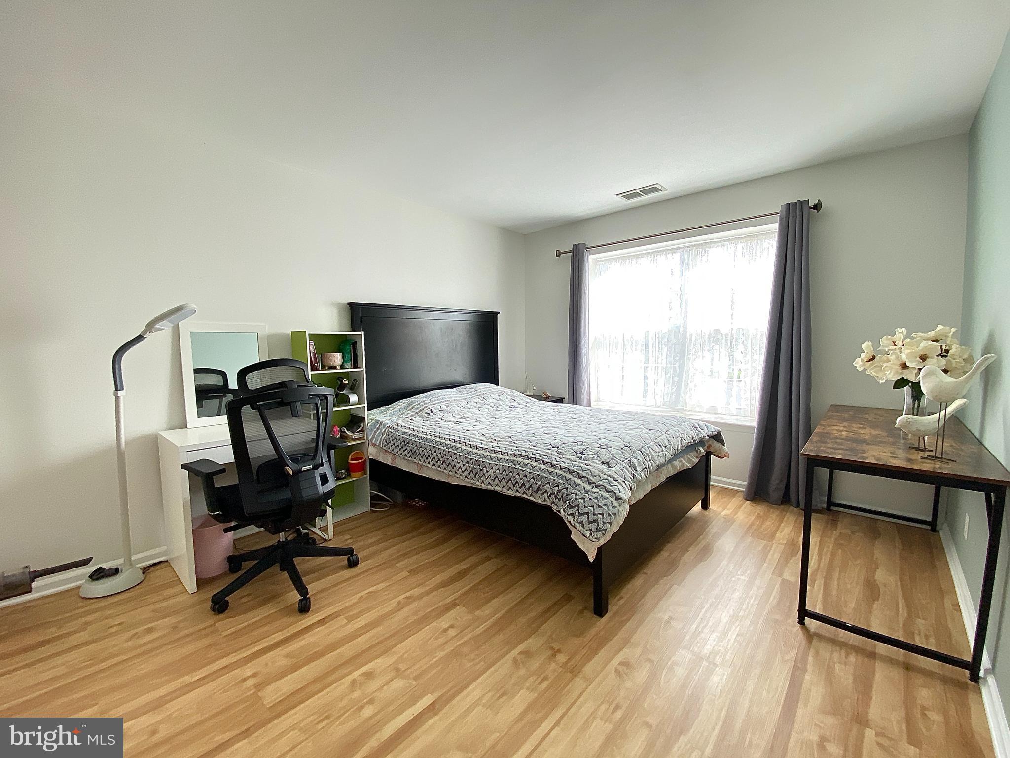 508 Trescott Place Mount Laurel, NJ 08054 - Photo 8 of 12 a bedroom with a bed a desk and chair