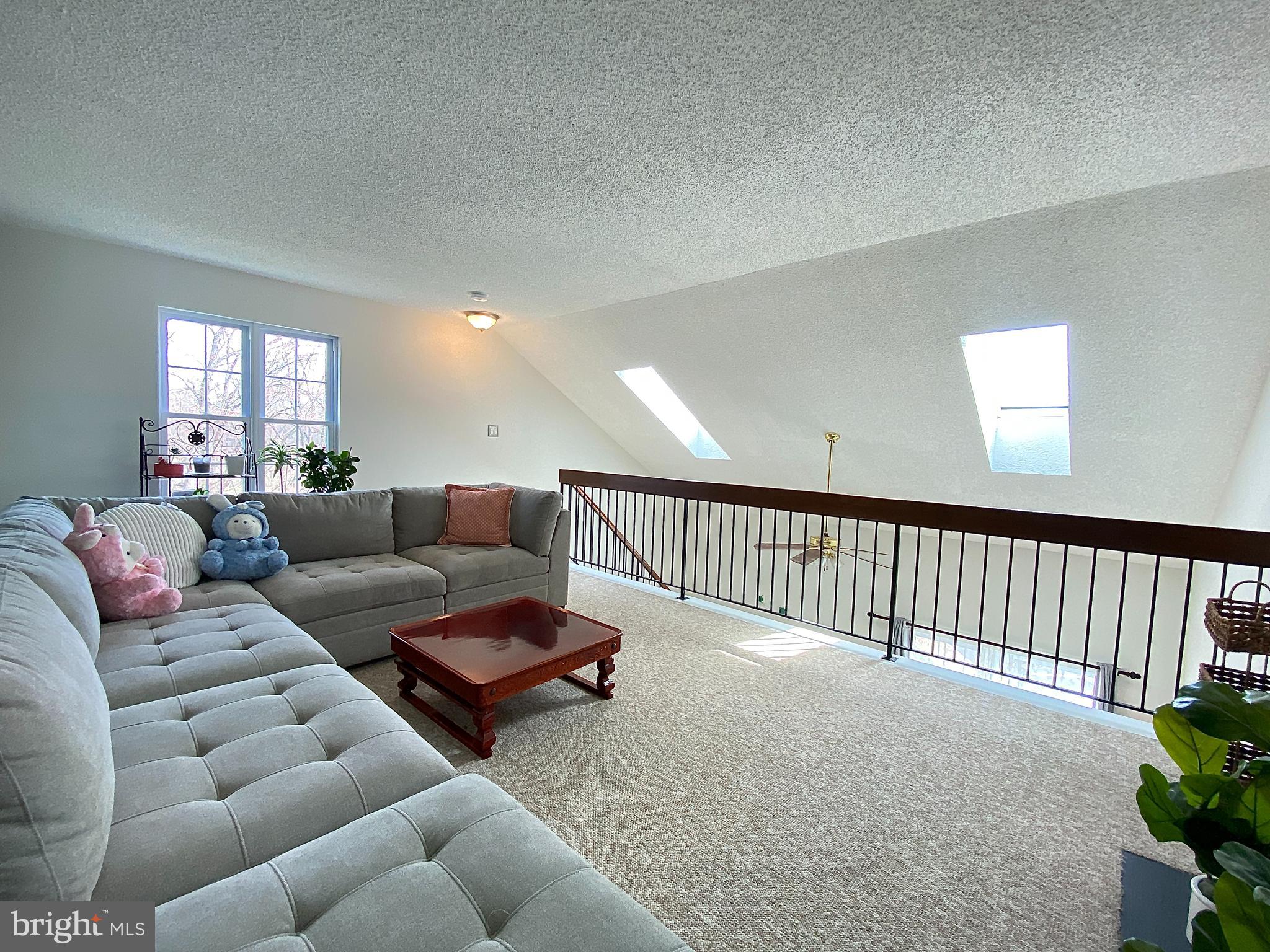 508 Trescott Place Mount Laurel, NJ 08054 - Photo 10 of 12 a living room with furniture and a window