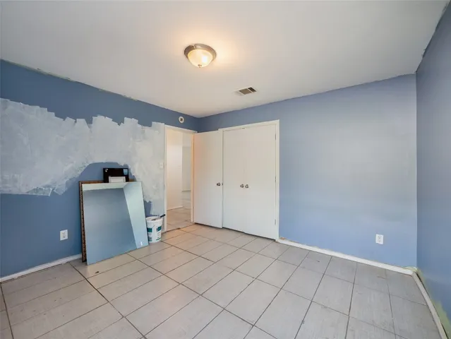 a view of a livingroom with a staircase