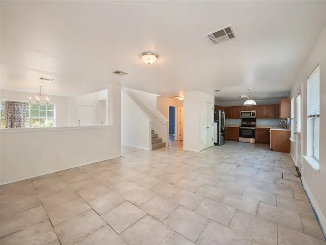 a view of livingroom with furniture and window