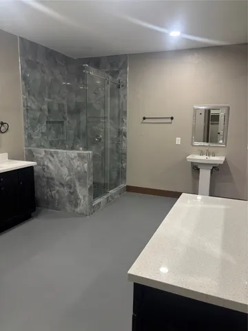 a bathroom with a sink and a mirror