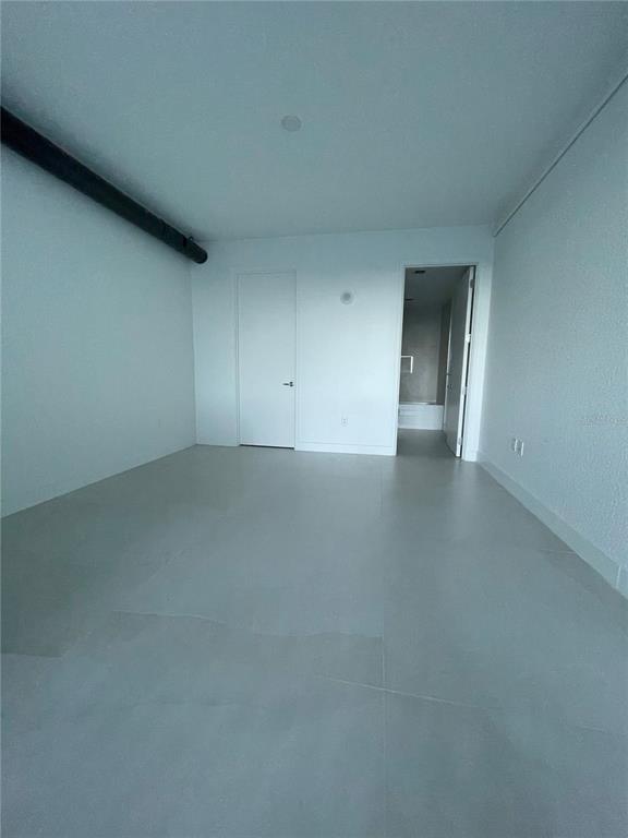 150 East Robinson Street, Unit 2A6 Orlando, FL 32801 - Photo 14 of 33 a view of an empty room and window