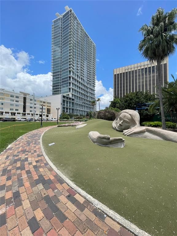 150 East Robinson Street, Unit 2A6 Orlando, FL 32801 - Photo 17 of 33 a view of a swimming pool with a potted plants