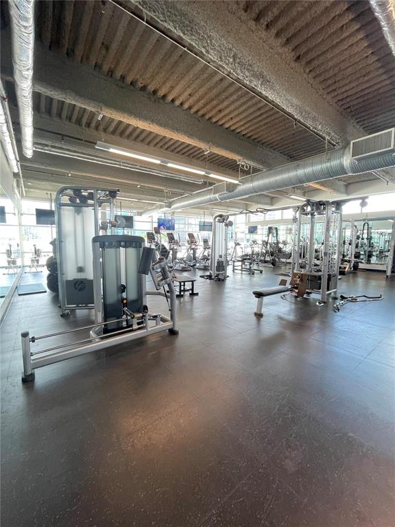 150 East Robinson Street, Unit 2A6 Orlando, FL 32801 - Photo 28 of 33 a view of a room with gym equipment