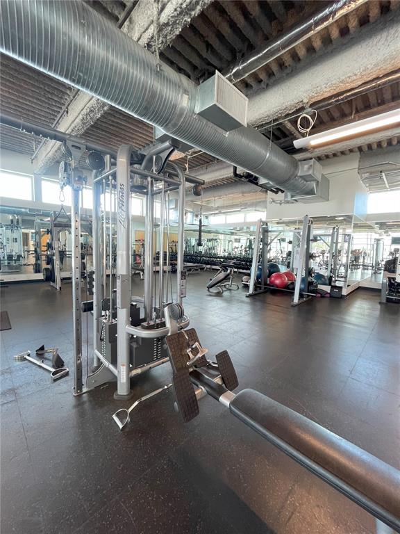 150 East Robinson Street, Unit 2A6 Orlando, FL 32801 - Photo 29 of 33 a view of a room with gym equipment