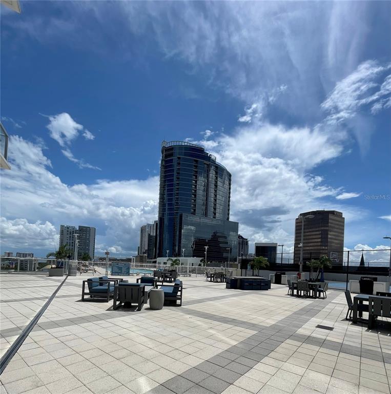 150 East Robinson Street, Unit 2A6 Orlando, FL 32801 - Photo 30 of 33 a view of a terrace with sitting area