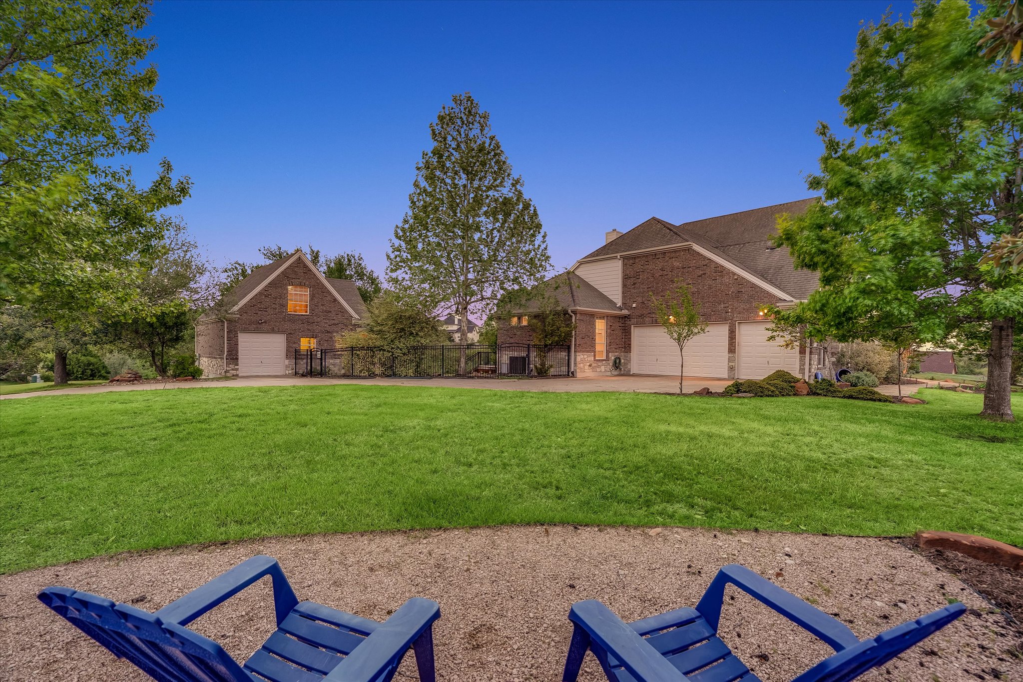 1400 Tom Sawyer Road Austin, TX 78737 - Photo 5 of 40 Expansive front lawn with mature trees offering space and privacy rarely found this close to Austin.