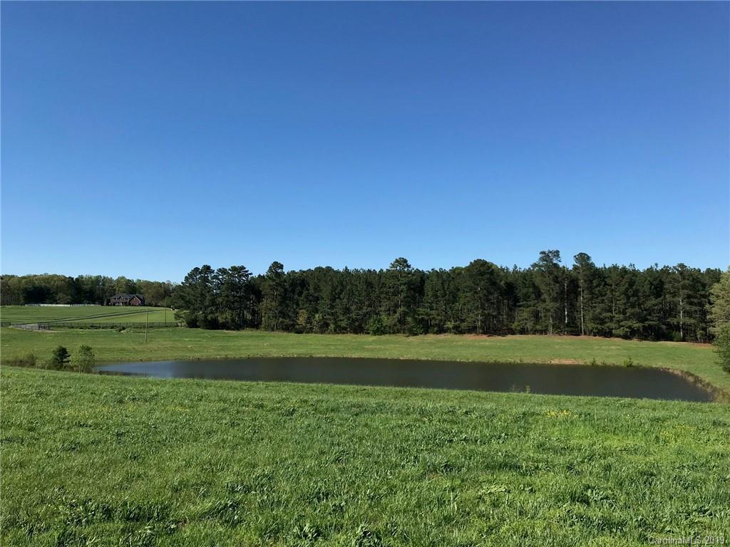12.40 Doggett Road Forest City, NC 28043 - Photo 2 of 16 a view of field with trees in the background
