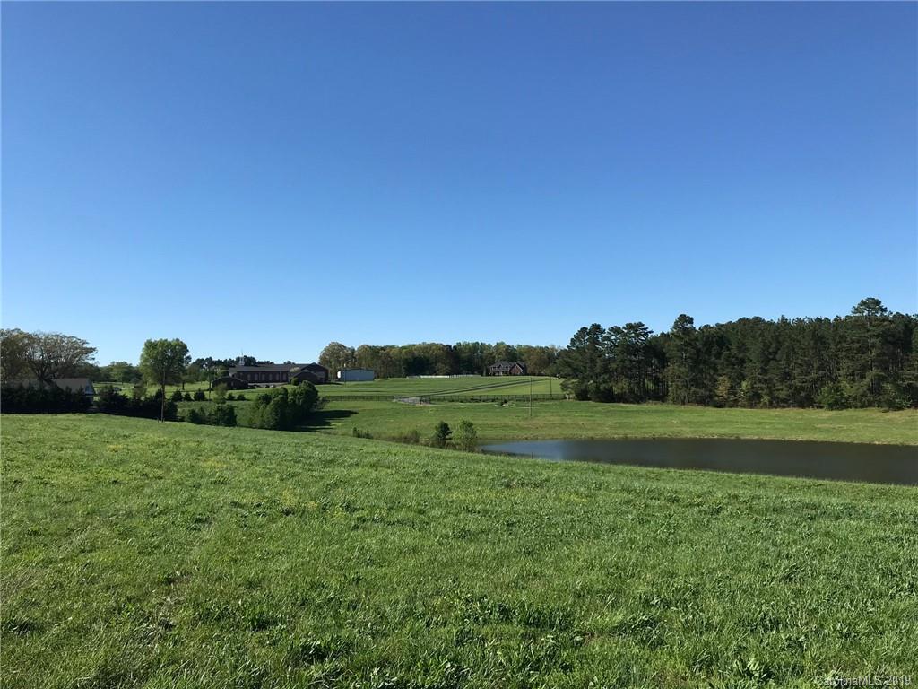 12.40 Doggett Road Forest City, NC 28043 - Photo 5 of 16 a view of grassy field with trees