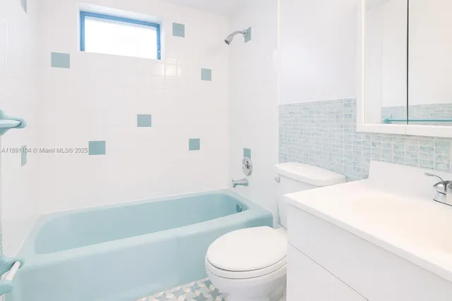 a view of swimming pool from a lounge chair