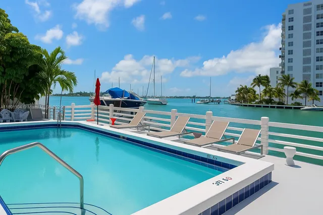 a view of sign board with buildings